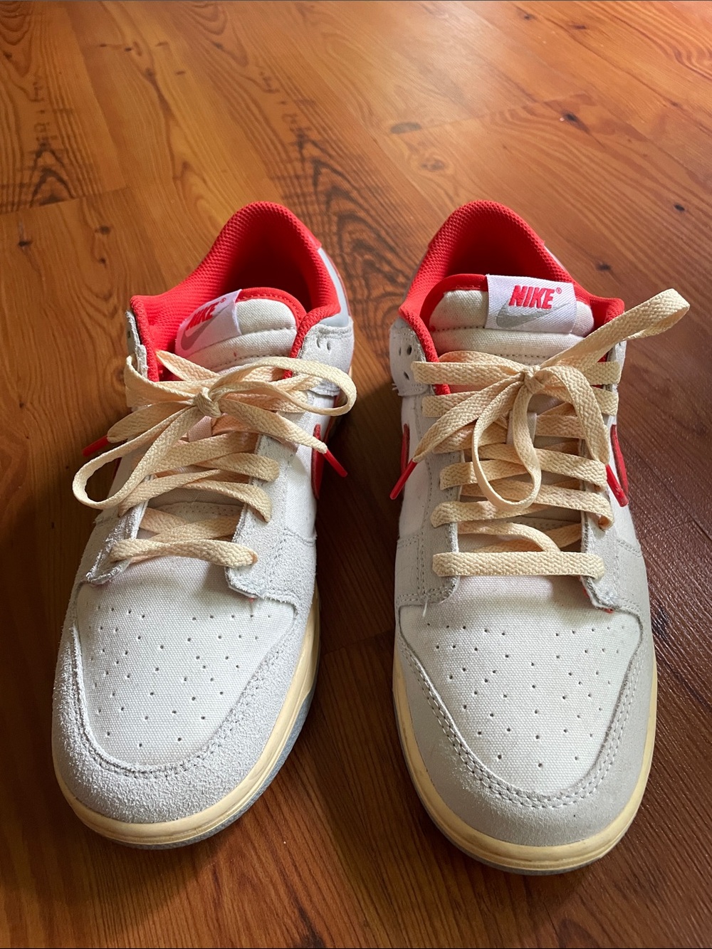 Nike Low-Top Sneakers in Cream with Orange Accents